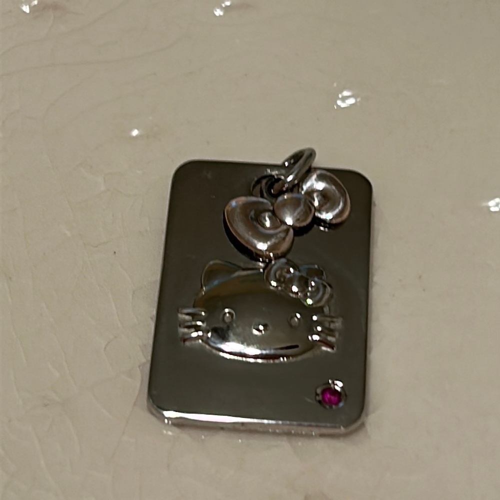 Sterling Silver Hello Kitty Dog Tag pendant with Ruby